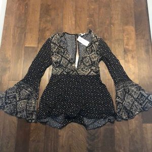 Printed romper with deep neckline